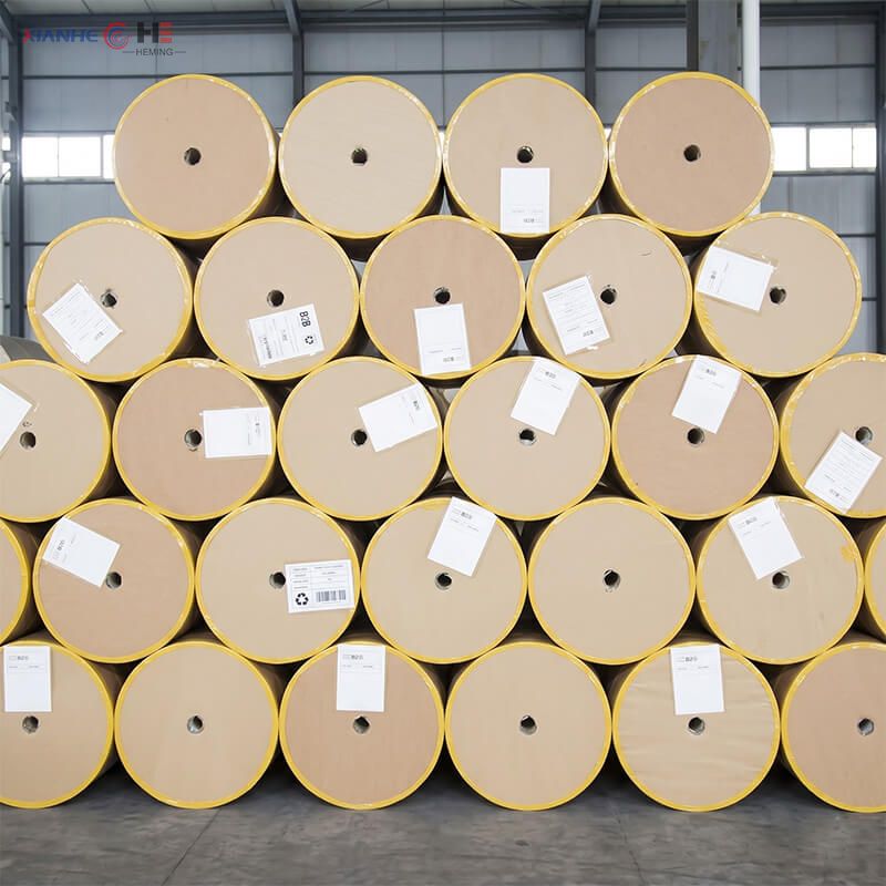 Grand inventaire de rouleaux de papier sulfuris&eacute; non blanchi provenant d'un fournisseur direct